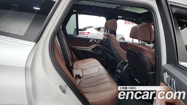 BMW X5 2022 — ფოტო 22/33