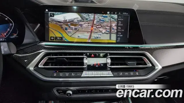 BMW X5 2022 — ფოტო 19/33