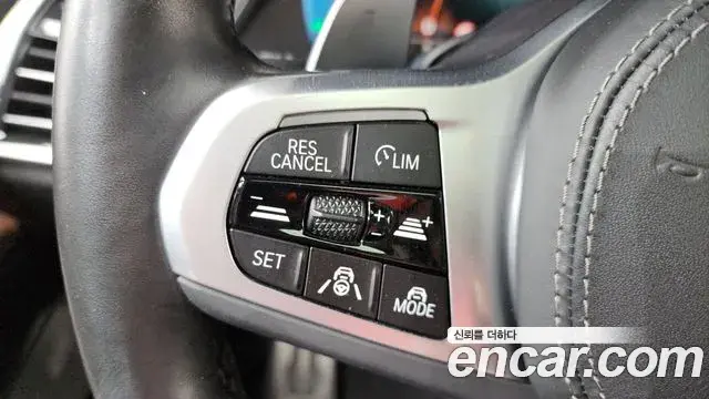 BMW X5 2022 — ფოტო 29/33