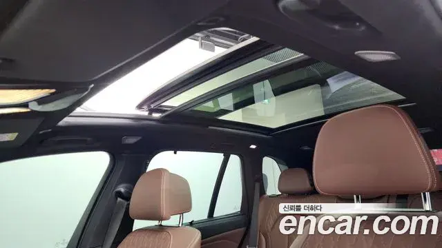 BMW X5 2022 — ფოტო 23/33