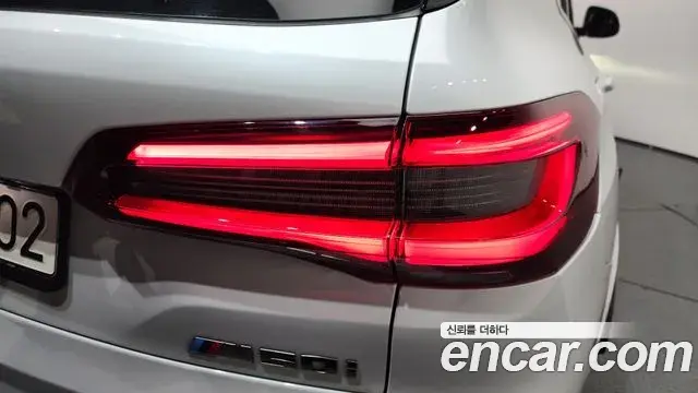 BMW X5 2022 — ფოტო 26/33
