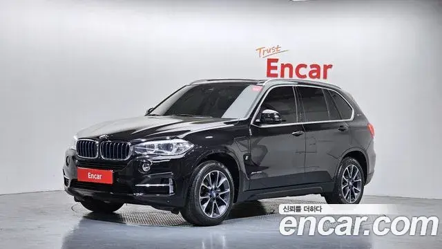 BMW X5 2018 — ფოტო 16/31