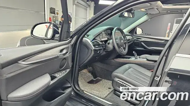 BMW X5 2018 — ფოტო 20/31