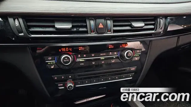 BMW X5 2018 — ფოტო 28/31
