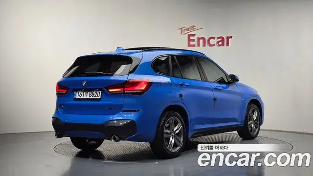 BMW X1 2021 — Фото 2/20