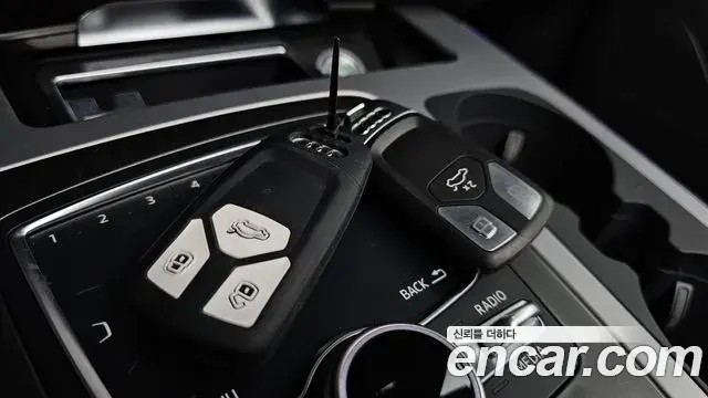 Audi Q7 2019 — ფოტო 2/31