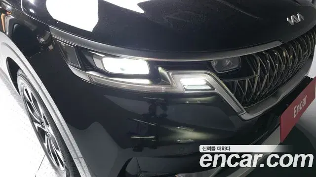 Kia Carnival 2022 — ფოტო 14/34