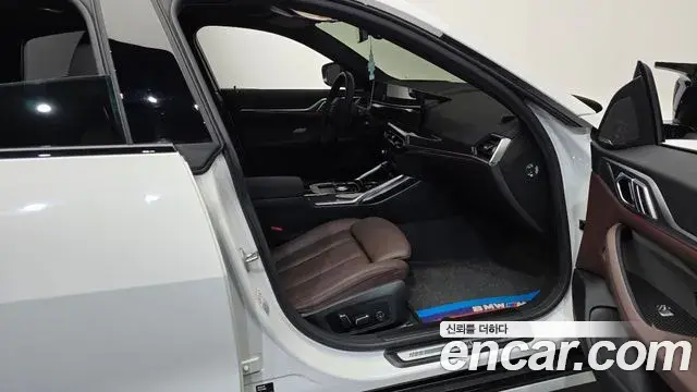 BMW 4 Series 2024 — Photo 1/34