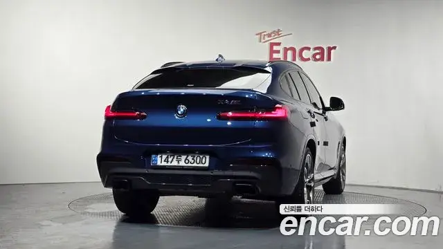 BMW X4 2021 — ფოტო 28/32