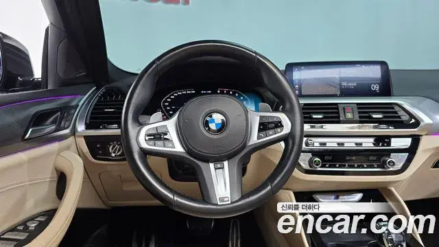 BMW X4 2021 — ფოტო 14/32