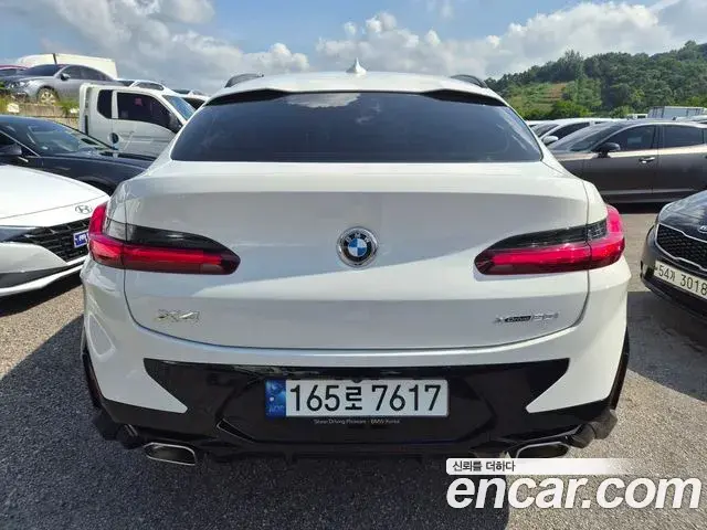 BMW X4 2022 — ფოტო 4/20