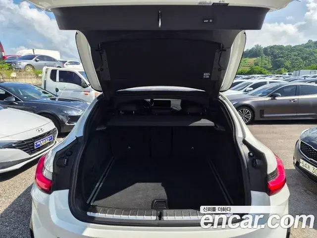 BMW X4 2022 — ფოტო 11/20