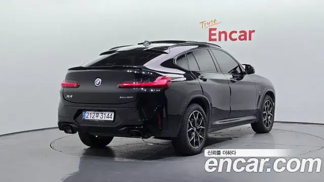 BMW X4 2023 — Фото 2/20