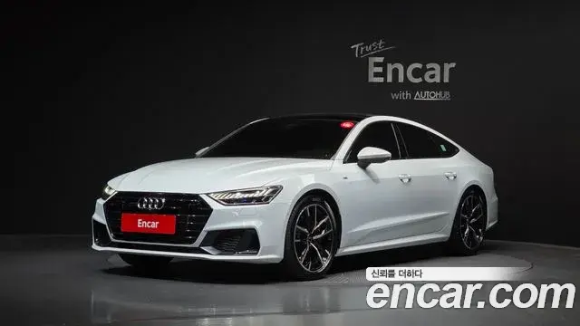 Audi A7 2021 — ფოტო 26/32