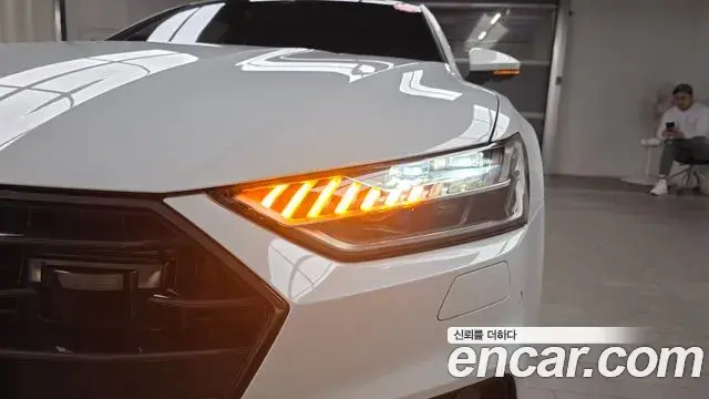 Audi A7 2021 — ფოტო 8/32