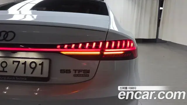 Audi A7 2021 — ფოტო 32/32
