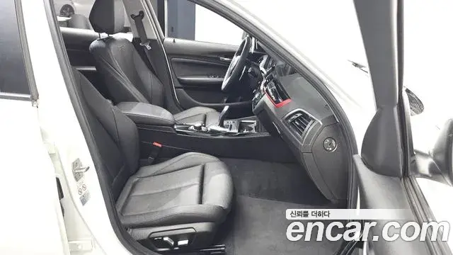BMW 1 Series 2018 — ფოტო 25/31