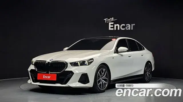 BMW 5 Series 2024 — Фото 1/20