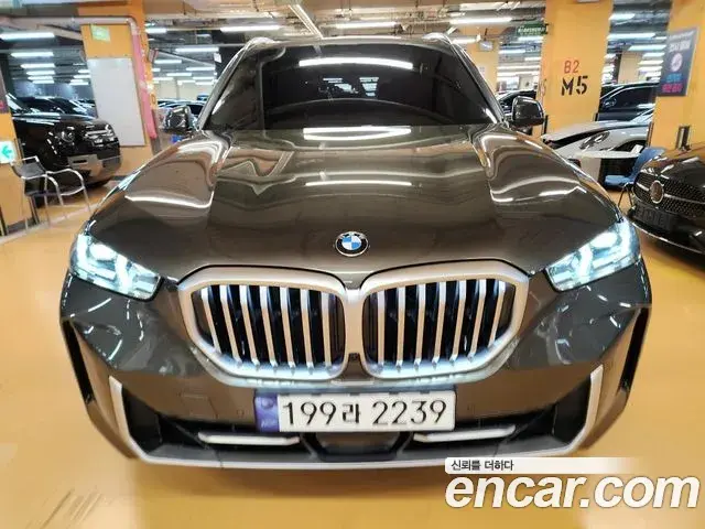BMW X5 2024 — Фото 1/20
