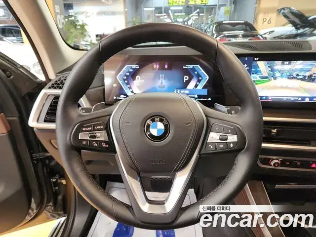 BMW X5 2024 — Фото 12/20
