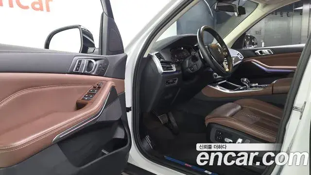 BMW X5 2022 — Фото 10/20