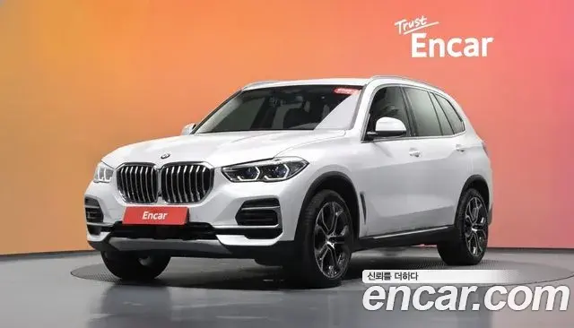BMW X5 2022 — Фото 1/20