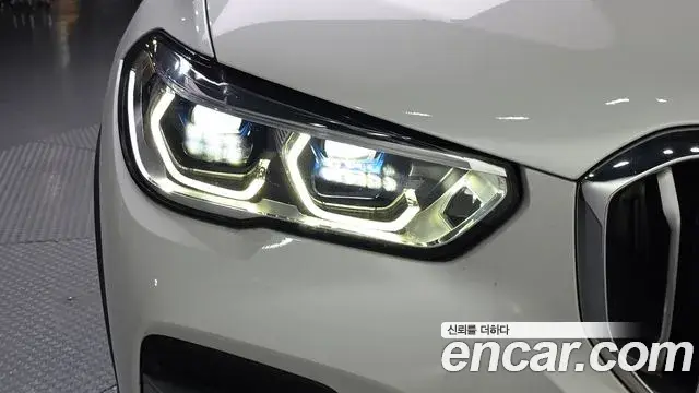 BMW X5 2022 — ფოტო 19/34