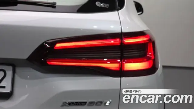 BMW X5 2022 — ფოტო 25/34