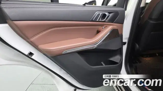 BMW X5 2022 — ფოტო 30/34