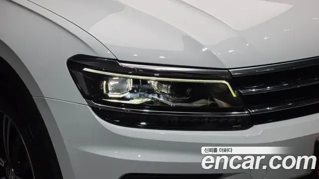 Volkswagen Tiguan 2019 — ფოტო 18/34