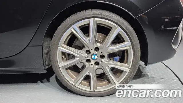 BMW 1 Series 2023 — Şəkil 27/32