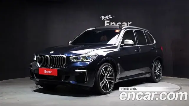 BMW X5 2022 — Фото 1/20