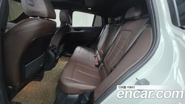BMW X4 2024 — Photo 12/20