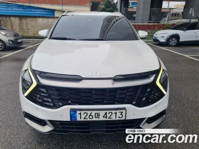 Kia Sportage 2022 — Фото 1/20
