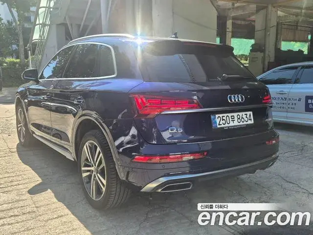 Audi Q5 2023 — Фото 4/20