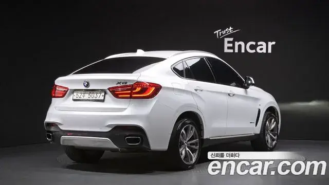 BMW X6 2018 — Фото 2/20