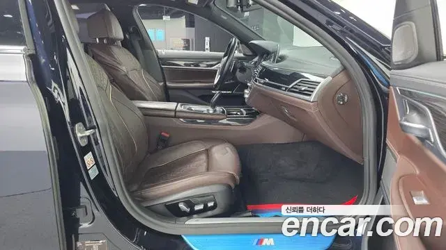 BMW 7 Series 2018 — Фото 11/20