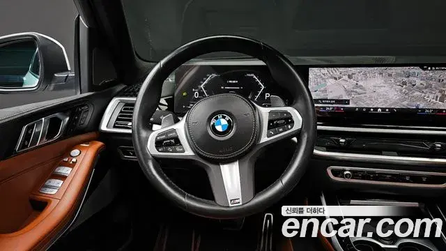 BMW X7 2023 — ფოტო 15/20