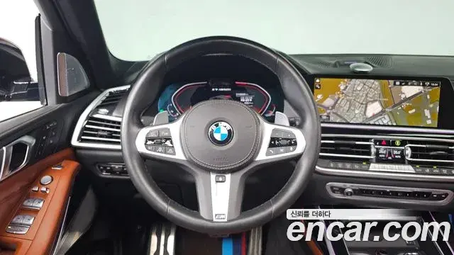 BMW X7 2021 — ფოტო 19/20