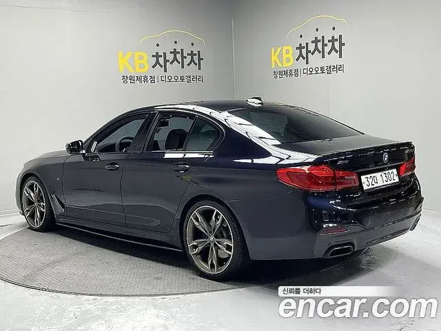 BMW 5 Series 2019 — ფოტო 18/20