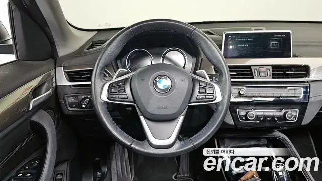 BMW X1 2021 — ფოტო 9/20