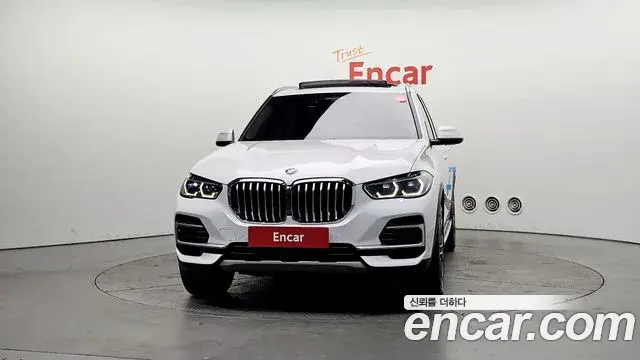 BMW X5 2022 — ფოტო 4/20