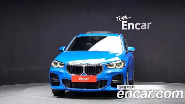 BMW X1 2022 — ფოტო 4/20