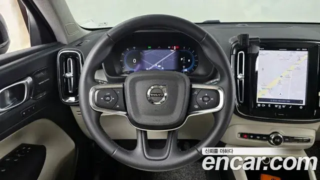 Volvo XC40 2023 — ფოტო 12/20