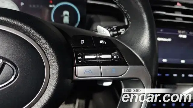 Hyundai Tucson Hybrid 2021 — ფოტო 1/34