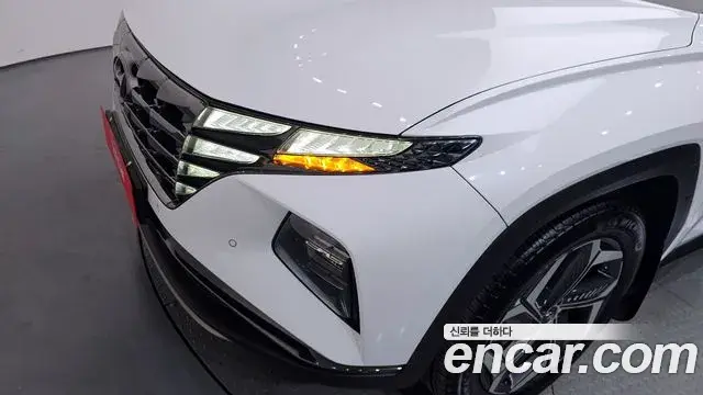 Hyundai Tucson Hybrid 2021 — ფოტო 10/31