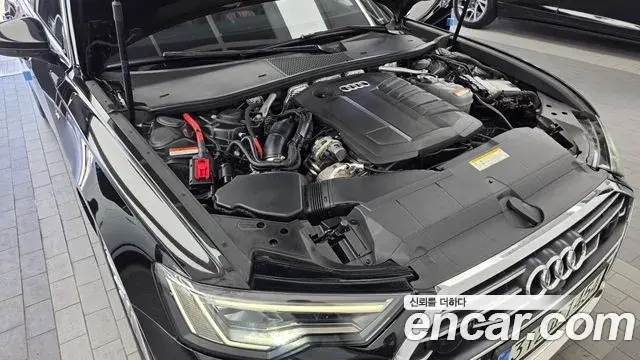 Audi A6 2021 — ფოტო 25/35