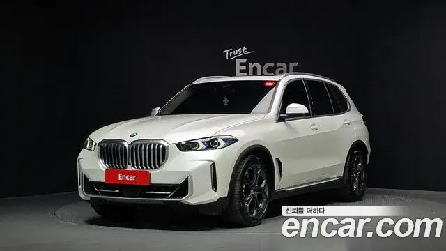BMW X5 2024 — ფოტო 14/34