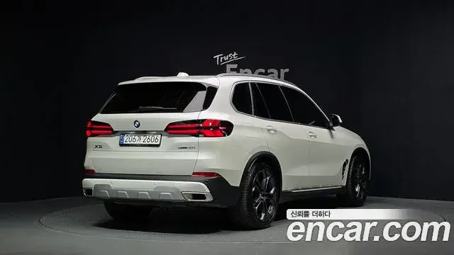 BMW X5 2024 — ფოტო 24/34