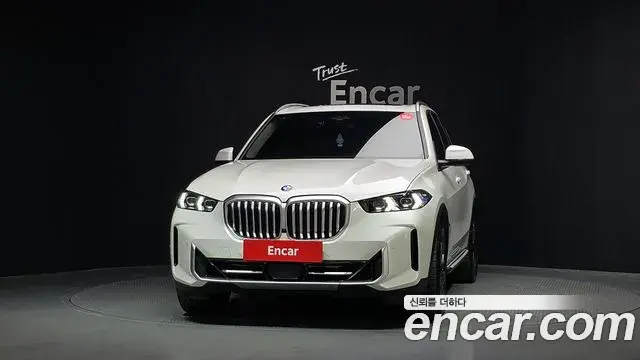 BMW X5 2024 — ფოტო 27/34